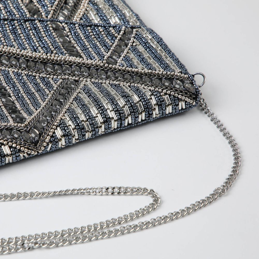 Clutch Milan Plateado Humana