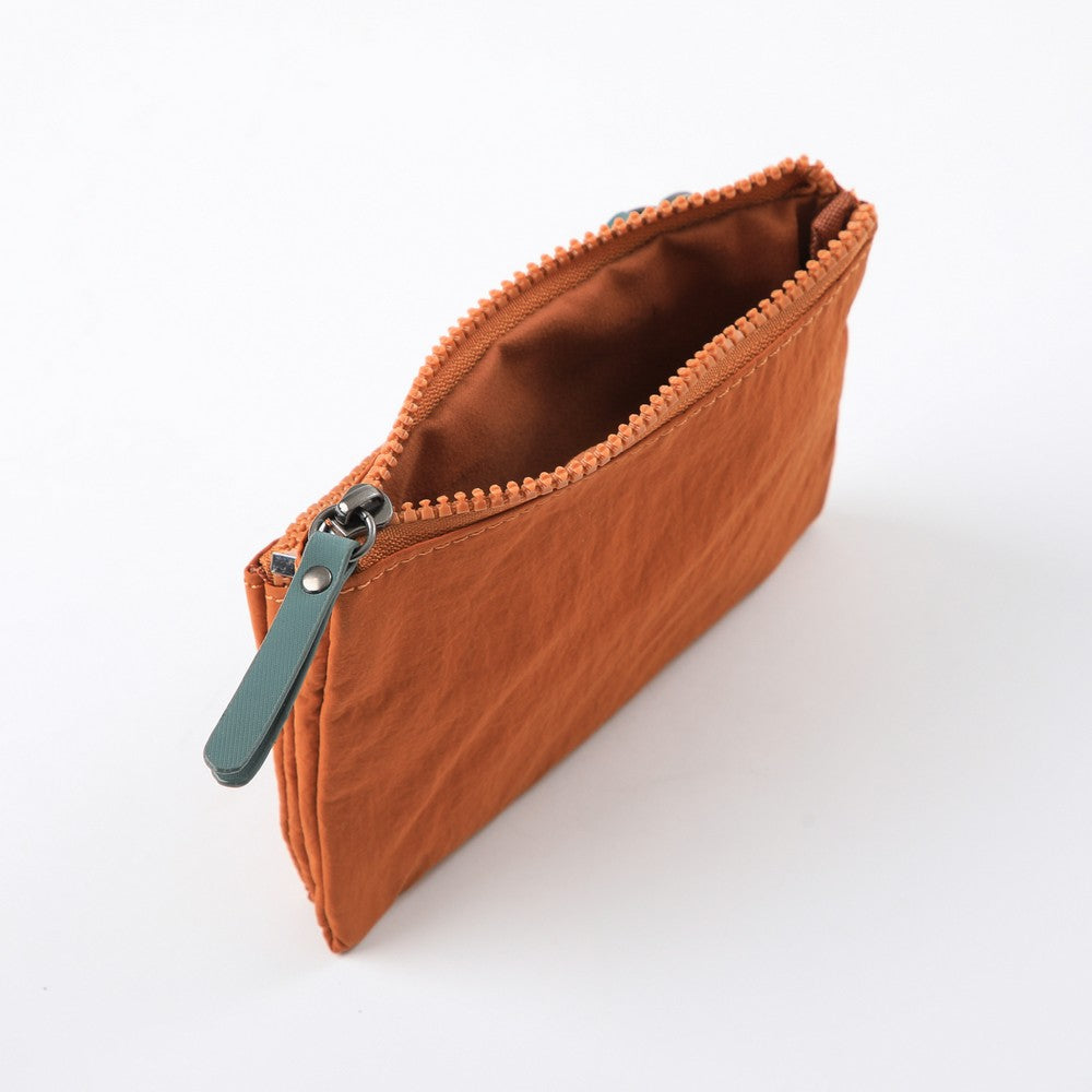 Monedero Polo Terracota Humana