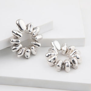 Aros Mediano Escultura Plateado Humana