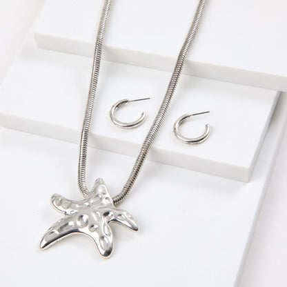 Set De Collar Drop Plateado Humana