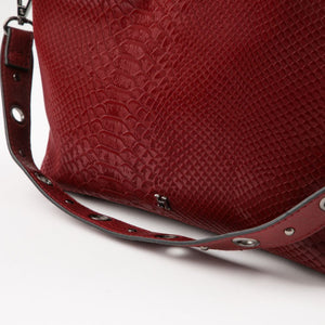 Cartera Bandolera Flora Ecocuero burdeo ojetillos Humana