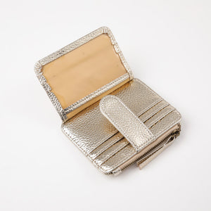 Tarjetero Nix Dorado Humana