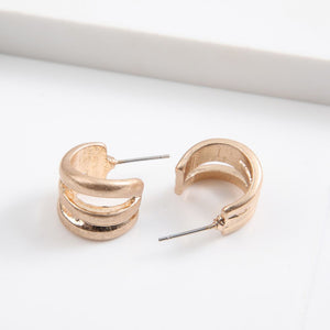 Aros Pegado Semicirculo Dorado Humana