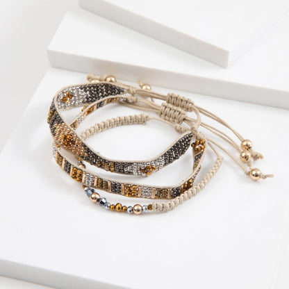 Set De 3 Pulseras Tejidas Dorado Humana