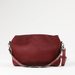 Cartera Bandolera Flora Ecocuero burdeo ojetillos Humana