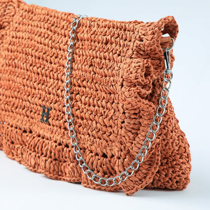 Cartera Clutch Naia Naranjo Humana