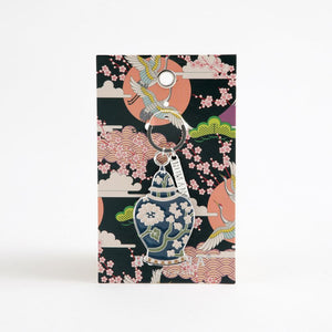 Llavero Vase Flores Plateado Humana