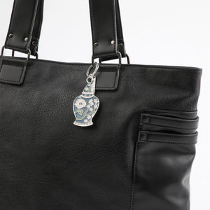 Llavero Vase Flores Plateado Humana