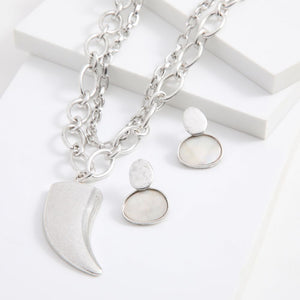 Set de Collar y Aros Tooth Plateado Humana