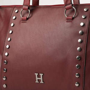 Cartera Tote Erika Ecocuero burdeo con tachas Humana