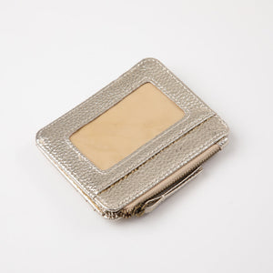 Tarjetero Nix Dorado Humana