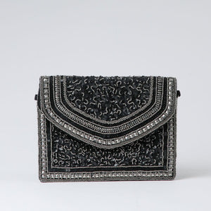 Clutch Mykonos Negro Humana