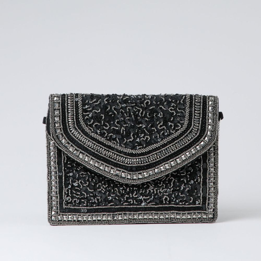 Clutch Mykonos Negro Humana