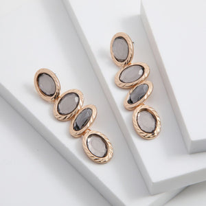 Aros largos Zuka Circones ovalados dorado ID