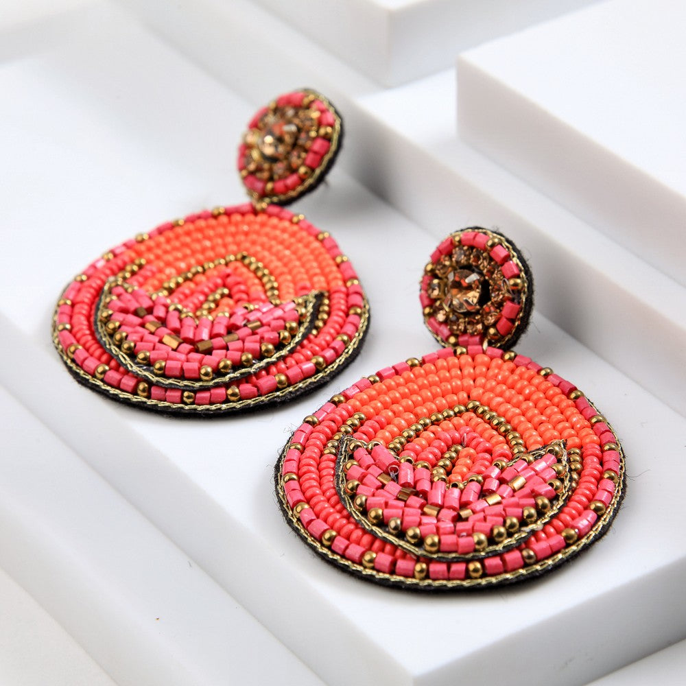 Aros Largos Teal Fucsia Humana